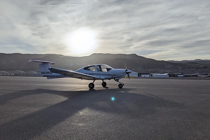 Small aircraft on runway.