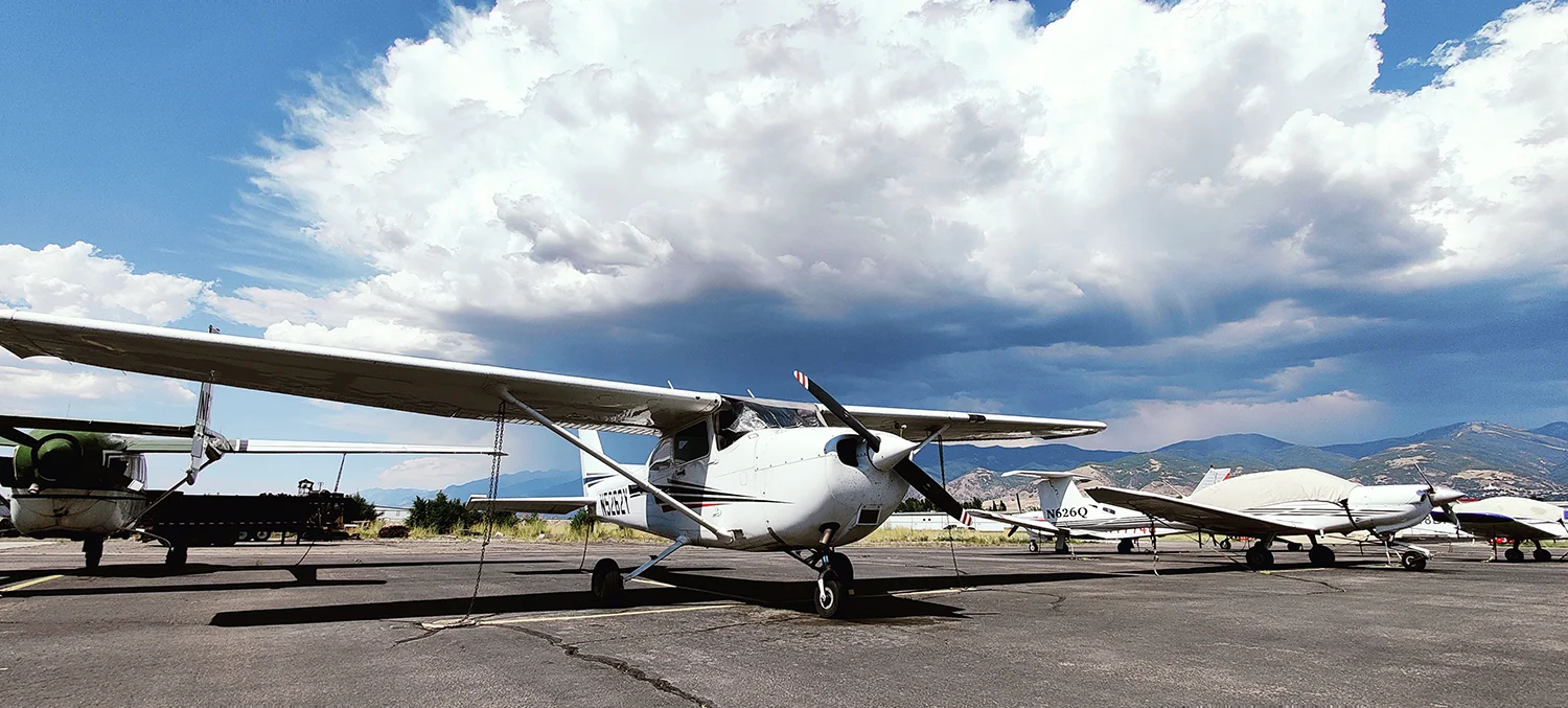 Small airplane on the runway.
